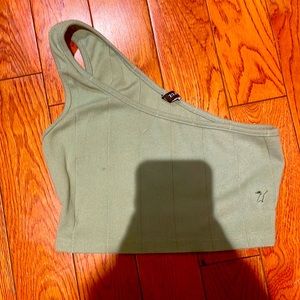 Green two piece set. Asymmetrical top.